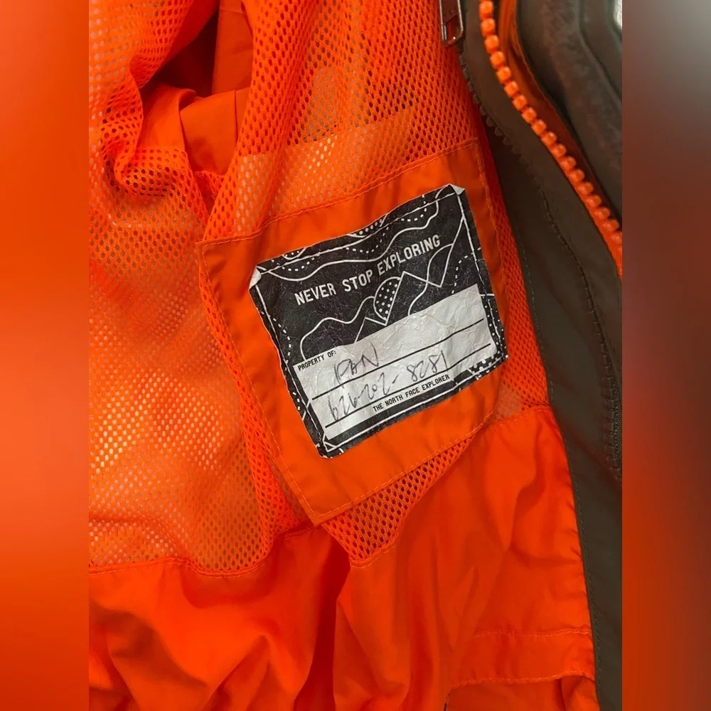 The North Face Olive Jacket with Orange Highlights